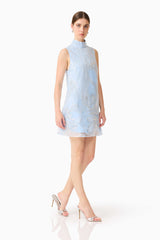 Brunette model wearing the Annabelle Embellished Shift Mini Dress in Blue side shot