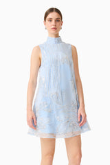 Brunette model wearing the Annabelle Embellished Shift Mini Dress in Blue close up shot