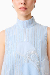 Brunette model wearing the Annabelle Embellished Shift Mini Dress in Blue detail shot