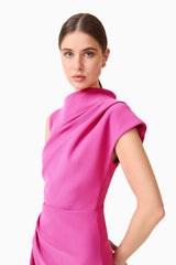 Model wearing the Chantal Asymmetrical Midi Dress in Pink close up shot 