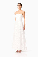 Brunette model wearing Elara Beaded Gown in White side shot 