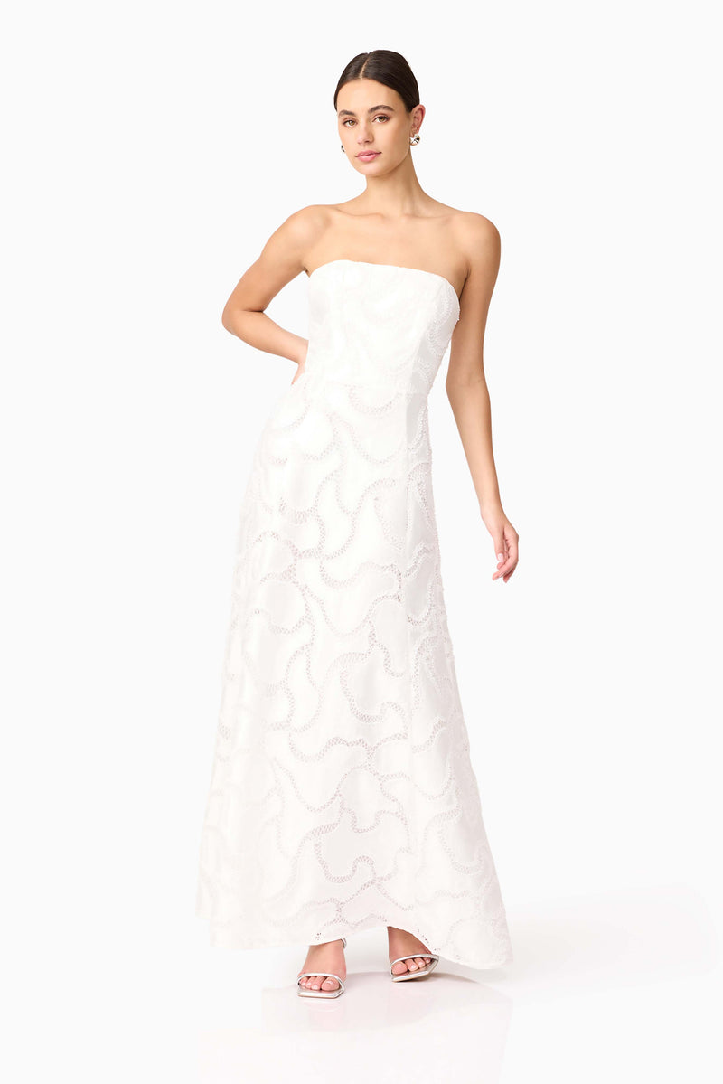Brunette model wearing Elara Beaded Gown in White posed shot 