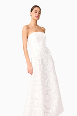 Brunette model wearing Elara Beaded Gown in White close up shot 
