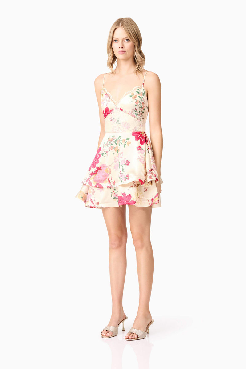 Blonde model wearing Rosalina Tiered Mini Dress in Floral side shot