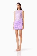 Brunette model wearing the Cerise Embellished Mini Dress in Purple side shot