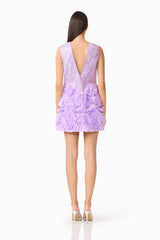 Brunette model wearing the Cerise Embellished Mini Dress in Purple back shot