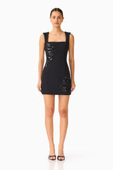 Brunette model wears the Odelia Beaded Mini Dress in Black front shot