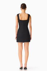 Brunette model wears the Odelia Beaded Mini Dress in Black back shot