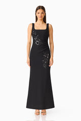 Brunette model wearing the Odelia Beaded Maxi Dress in Black front shot