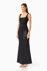 Brunette model wearing the Odelia Beaded Maxi Dress in Black side shot