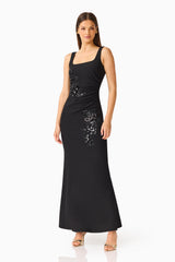 Brunette model wearing the Odelia Beaded Maxi Dress in Black posed shot
