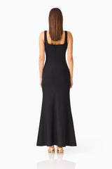 Brunette model wearing the Odelia Beaded Maxi Dress in Black back shot
