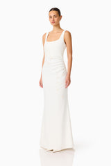Brunette model wearing the Odelia Beaded Maxi Dress in White side shot