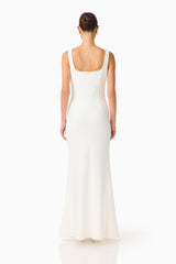Brunette model wearing the Odelia Beaded Maxi Dress in White back shot