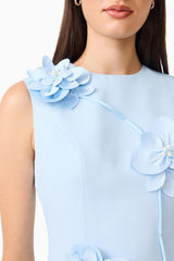 Brunette model wearing the Reina Applique Mini Dress in Sky Blue detail shot