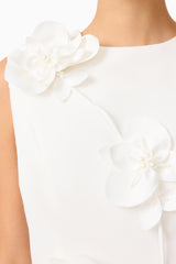 Brunette model wearing the Reina Applique Mini Dress Dress White detail shot