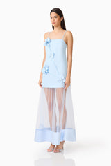 Brunette Model Wearing the Reina Applique Gown in Sky Blue Side Shot