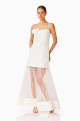 Brunette model wearing the Reina Appliqué Gown in White posed shot