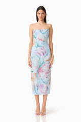 Brunette model wearing the Priselle Strapless Midi Dress in Blue Floral front shot