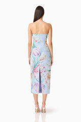 Brunette model wearing the Priselle Strapless Midi Dress in Blue Floral back shot