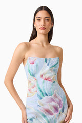 Brunette model wearing the Priselle Strapless Midi Dress in Blue Floral close up shot