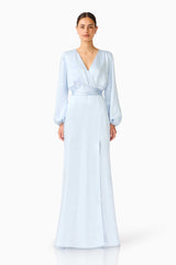 Brunette model wearing the Kai Long Sleeve Maxi Dress in Pale Blue front shot 