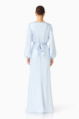 Brunette model wearing the Kai Long Sleeve Maxi Dress in Pale Blue back shot 