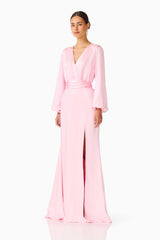 Brunette model wearing the Kai Long Sleeve Maxi Dress in Pale Pink side shot 