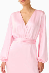 Brunette model wearing the Kai Long Sleeve Maxi Dress in Pale Pink detail shot 