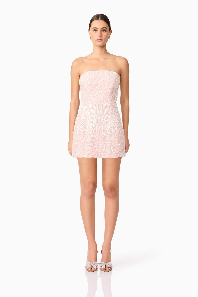 Brunette model wearing Kiki Strapless Mini Dress in Pink front shot