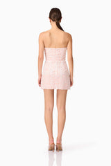 Brunette model wearing Kiki Strapless Mini Dress in Pink back shot