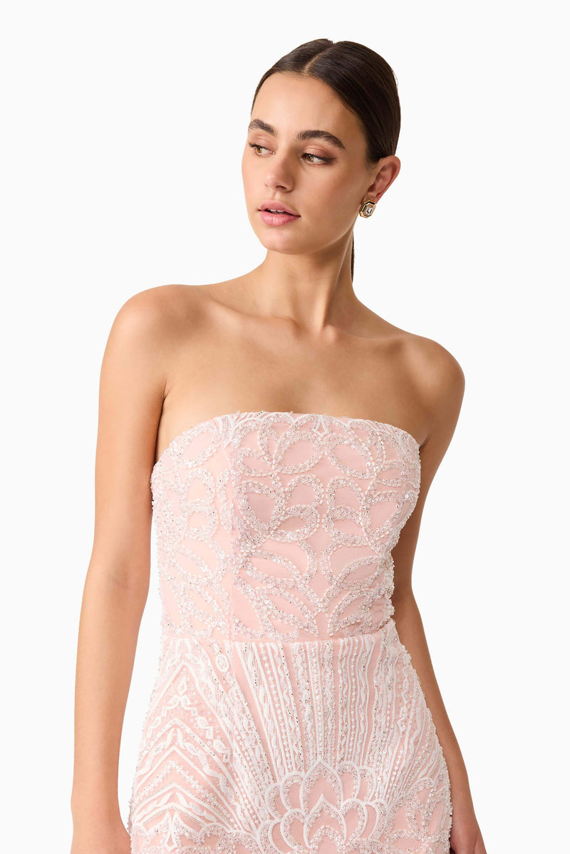 Brunette model wearing Kiki Strapless Mini Dress in Pink close up shot