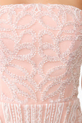 Brunette model wearing Kiki Strapless Mini Dress in Pink detail shot