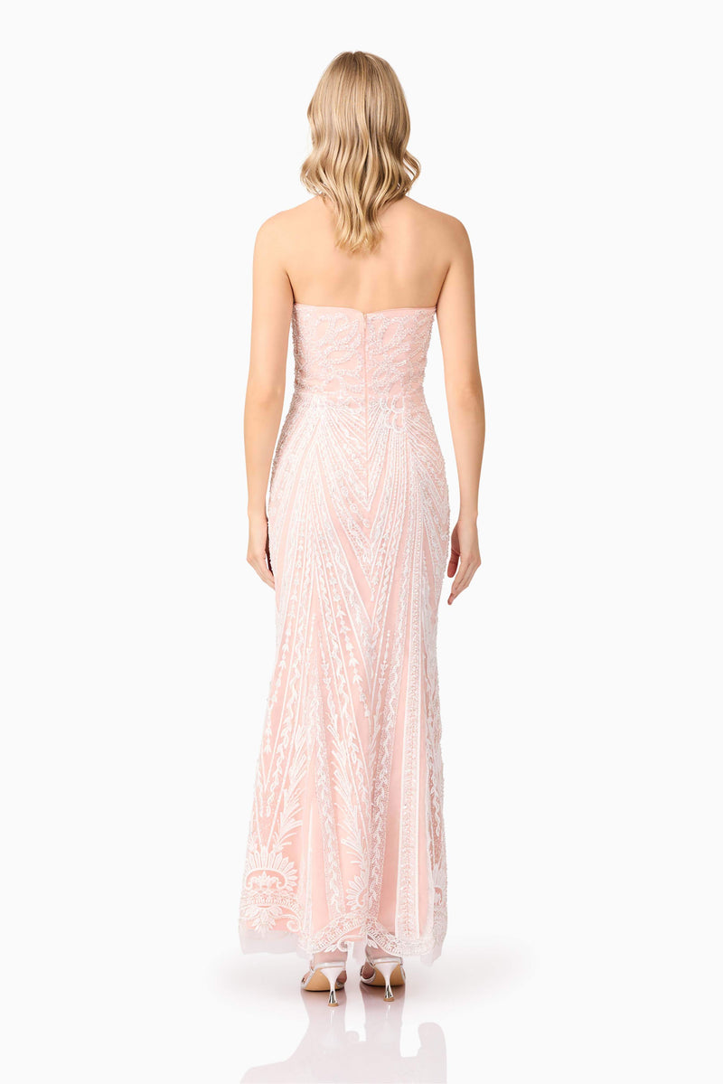Blonde model wearing Kiki Strapless Gown in Pink back shot