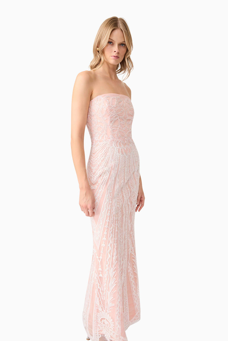 Blonde model wearing Kiki Strapless Gown in Pink posed shot