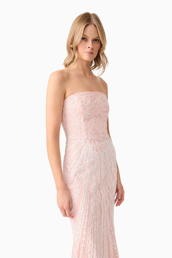 Blonde model wearing Kiki Strapless Gown in Pink close up shot