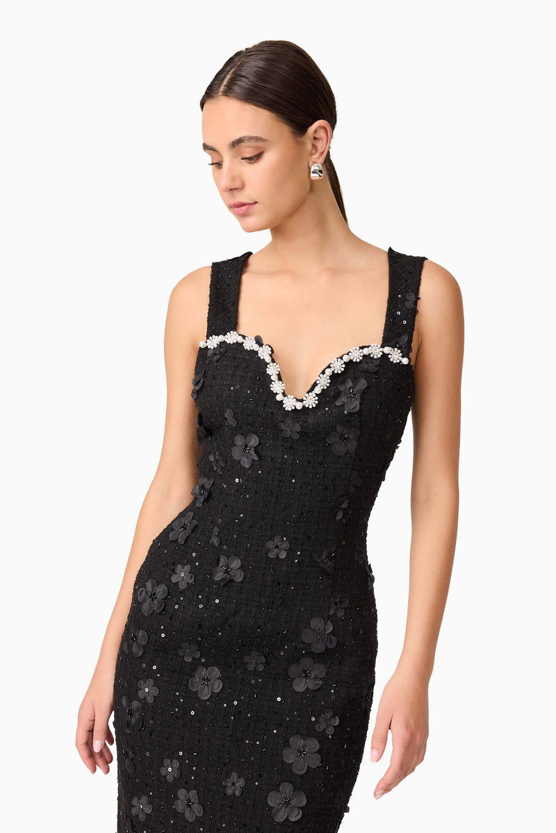 Brunette model wearing Ellouise Embellished Tweed Midi Dress in Black close up shot