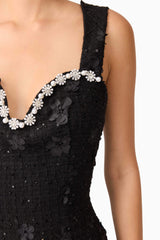 Brunette model wearing Ellouise Embellished Tweed Midi Dress in Black detail shot