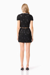 Blonde model wearing Ellouise Embellished Tweed Set in Black back shot