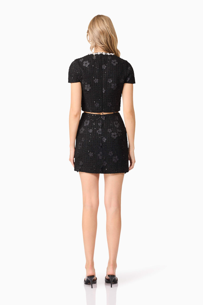 Blonde model wearing Ellouise Embellished Tweed Set in Black back shot