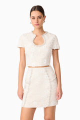 Brunette model wearing Ellouise Embellished Tweed Set in White close up detail
shot 
