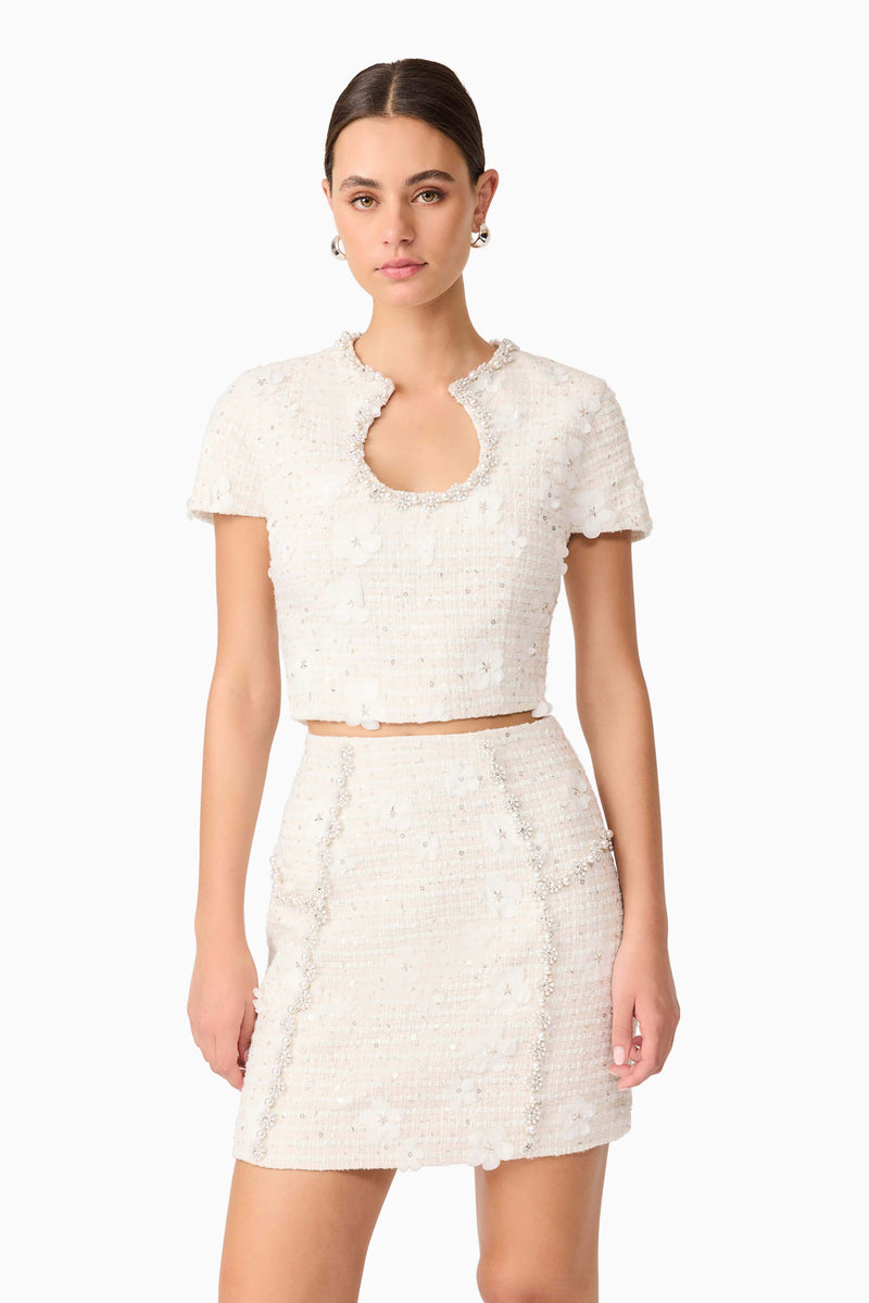 Brunette model wearing Ellouise Embellished Tweed Set in White close up detail
shot 