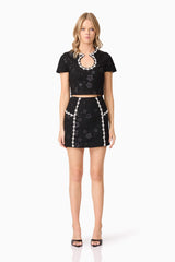 Blonde model wearing Ellouise Embellished Tweed Set in Black front shot