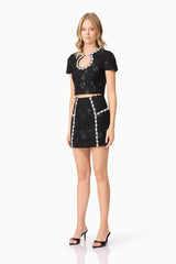 Blonde model wearing Ellouise Embellished Tweed Set in Black side shot
