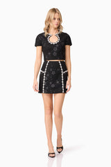 Blonde model wearing Ellouise Embellished Tweed Set in Black posed shot