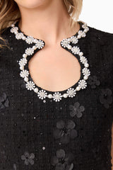 Blonde model wearing Ellouise Embellished Tweed Set in Black top detail shot