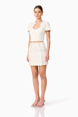 Brunette model wearing Ellouise Embellished Tweed Set in White side shot