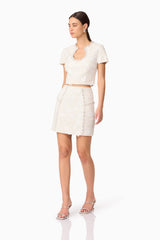 Brunette model wearing Ellouise Embellished Tweed Set in White posed shot