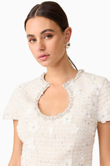 Brunette model wearing Ellouise Embellished Tweed Set in White close up shot