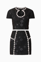 Blonde model wearing Ellouise Embellished Tweed Set in Black skirt ghost shot